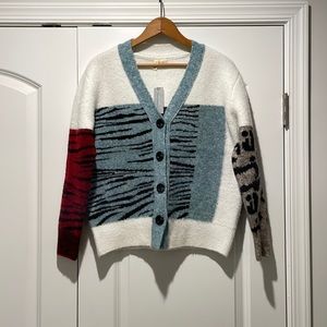 Cardigan sweater with multiple animal prints